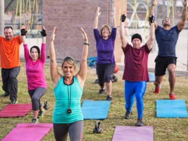 A group of adults doing yoga